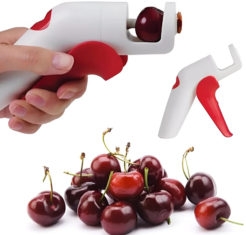 Stainless steel cherry kernel remover kitchen tool with red plunger and ergonomic handle.