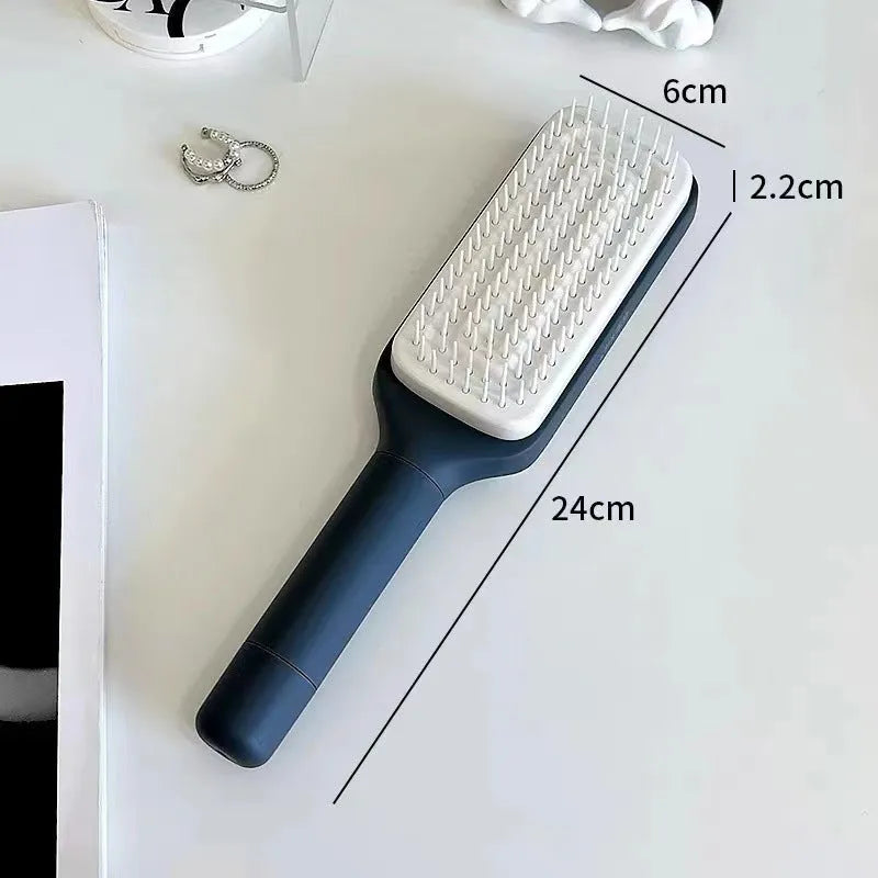 Roland purple self cleaning hair brush with rotating handle and anti-static bristles