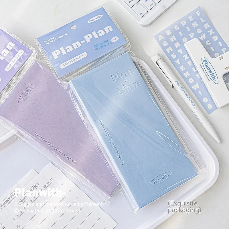Embossed simple visual daily meter book notebook showing colour options: white, purple, blue, grey, and protective cover.