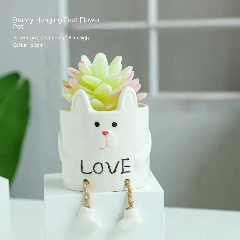 Ceramic hanging foot flowerpot for succulent plants in cartoon style with twelve colour variations on desktop