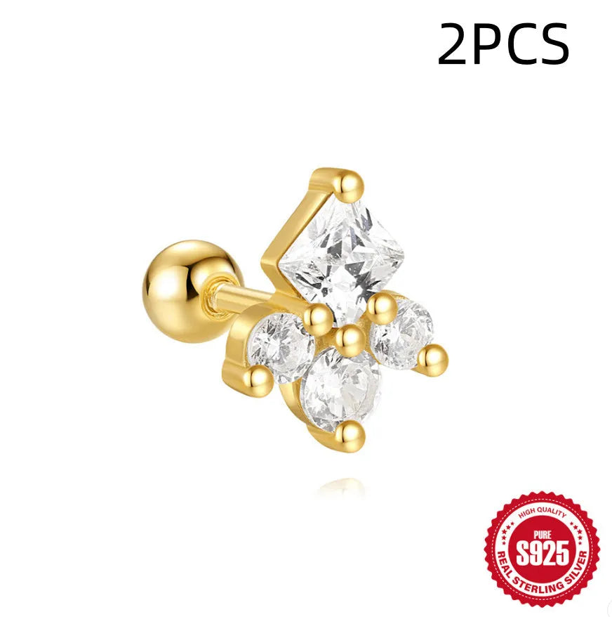 S925 sterling silver flower-shaped stud earrings with gravel texture in a gold electroplated finish.