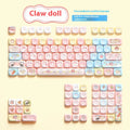 Doll-themed mechanical keyboard keycap set with sublimation dye colours showing anime character designs