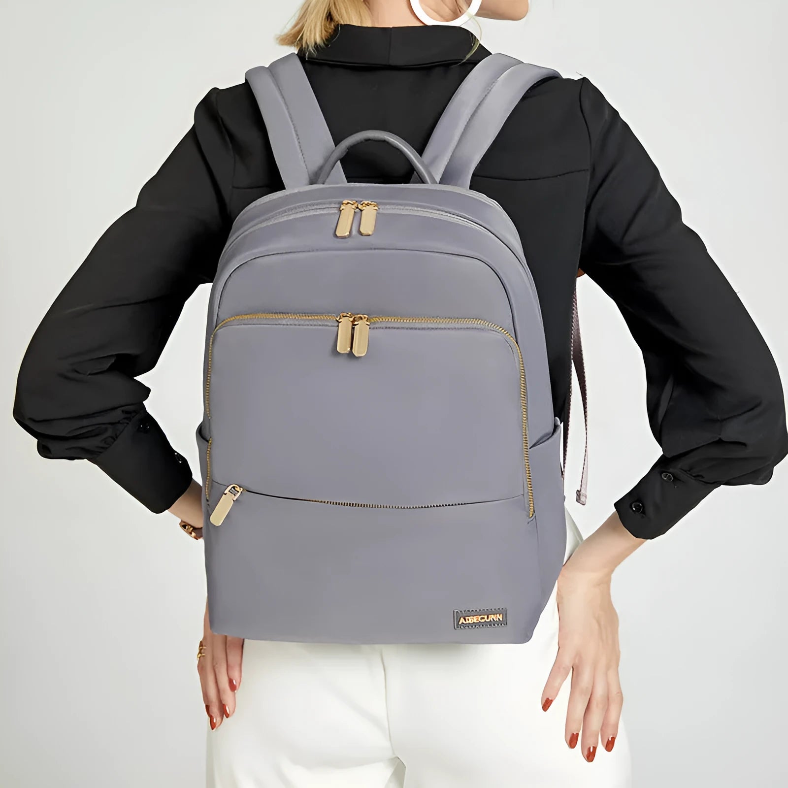Oxford cloth women's backpack in black or purplish grey with large capacity and anti-theft zipper