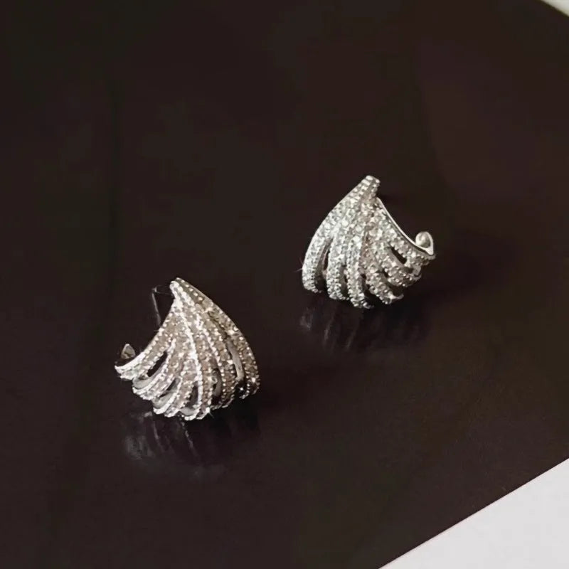 Geometric line design earrings with zircon stones and platinum electroplated finish
