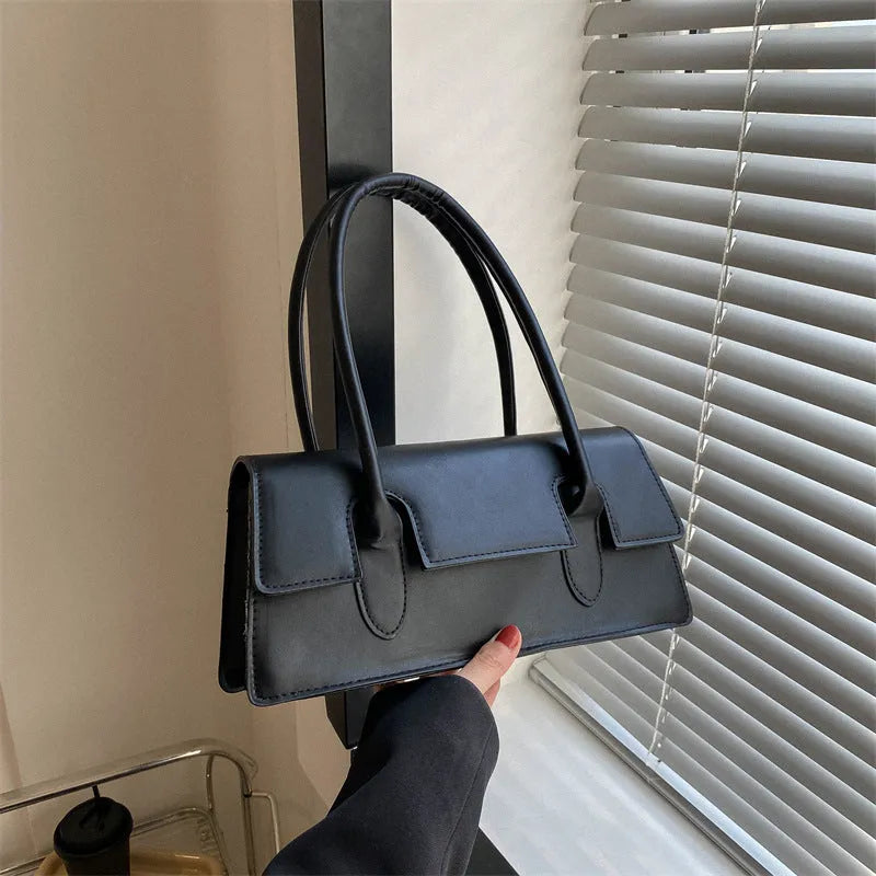 Women's small square shoulder bag in PU leather with stitching details and single strap