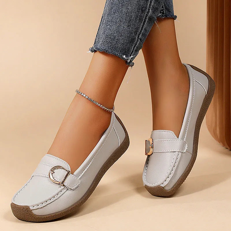 Women's casual loafers in artificial PU leather with round toe and beef tendon sole.