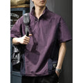 Men's brown half-zip short sleeve casual shirt with a stand collar, shown in a loose fit.