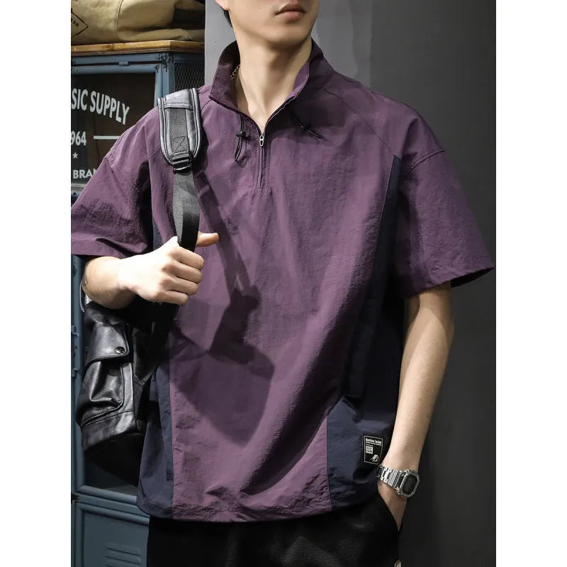 Men's brown half-zip short sleeve casual shirt with a stand collar, shown in a loose fit.