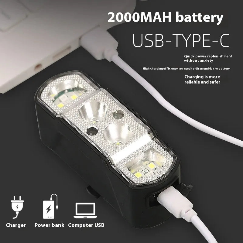 Black bicycle headlight with 350 lumen XPG-LED and rechargeable battery mounted on handlebars