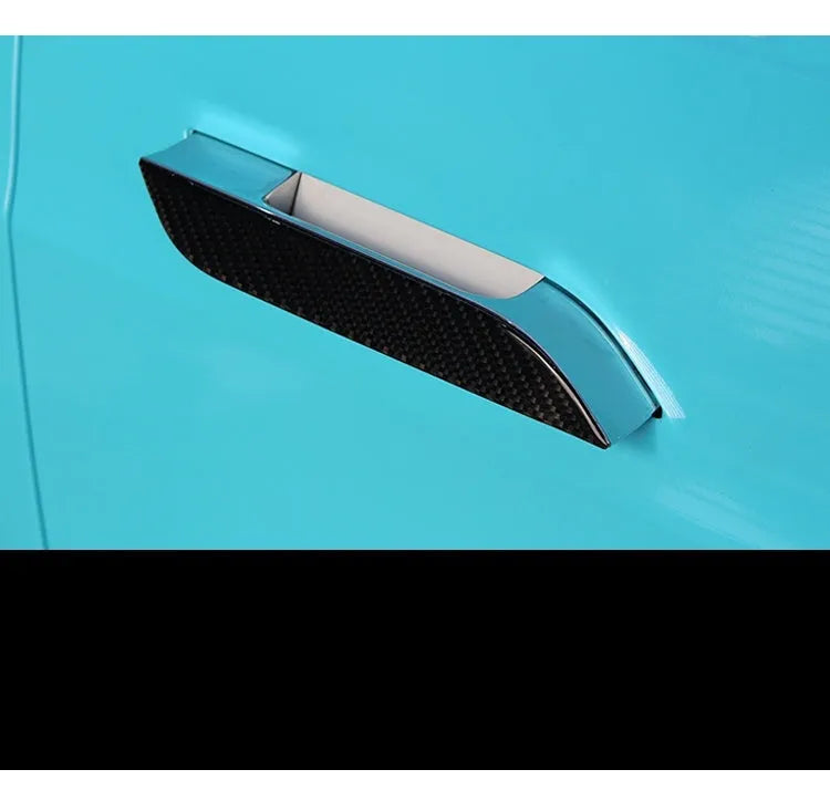 Four carbon fibre adhesive door handle protection patches for Tesla Model S with drip texture finish