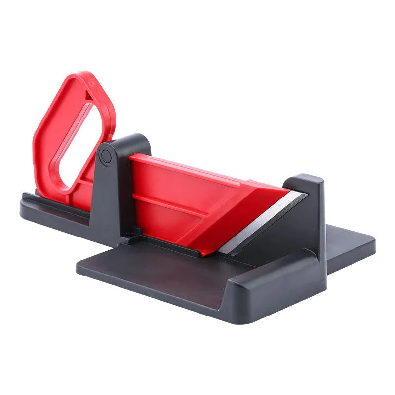 Green and red plastic vegetable cutter with stainless steel blades for carrots and potatoes