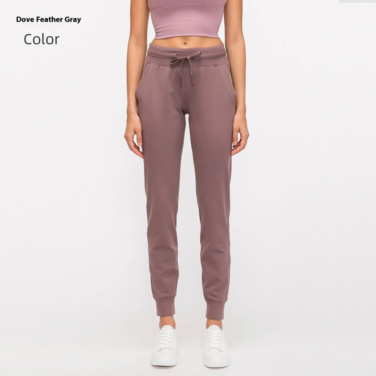 Women's high waist yoga pants with drawstring in navy blue, laid flat to show fit and fabric detail.