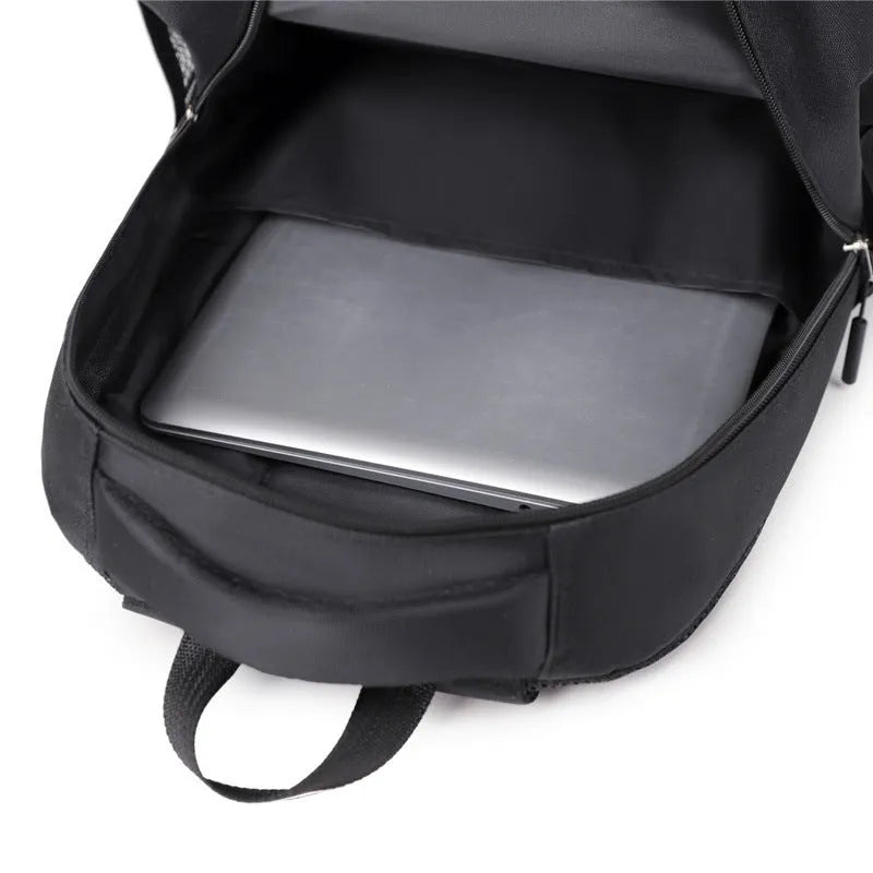 Men's casual Oxford cloth backpack in grey, shown alongside black, green, and blue colour options.