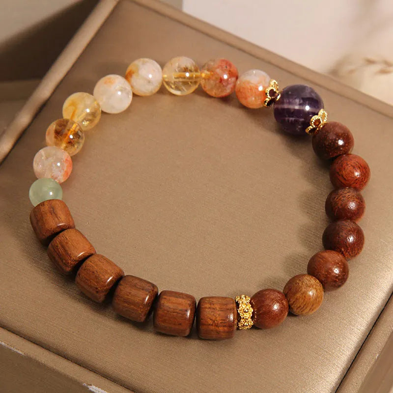 Women's pineapple yellow bracelet with yellow tower crystal, ebony amethyst beads, and pearl accents