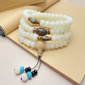 White jade bodhi bead bracelet with 108 beads in a mala style, shown in three different pattern options.