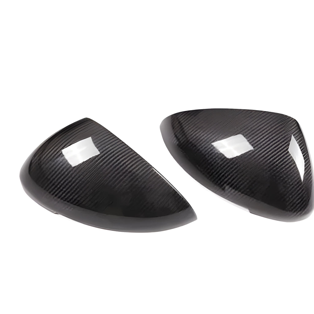 Black carbon fibre rearview mirror covers for Porsche Macan with woven texture detail