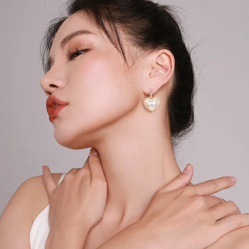 Gold coloured clip-on earrings for women with alloy metal construction