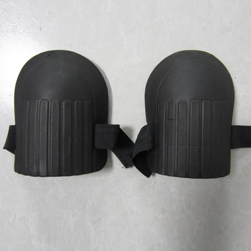 A pair of thick EVA foam knee pads in army green colour, shown on a grey background.
