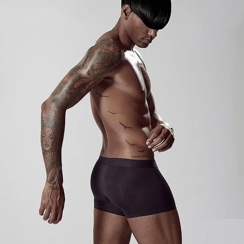 Men's seamless one-piece underwear in modal fabric showing body shaping design in solid colours
