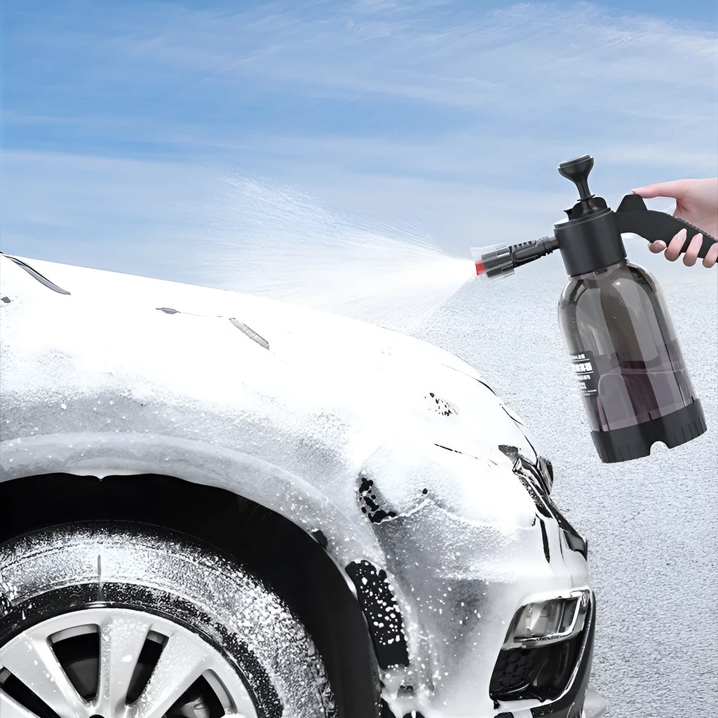 Black hand-held foam watering can with switch lock and two nozzles for garden and vehicle use