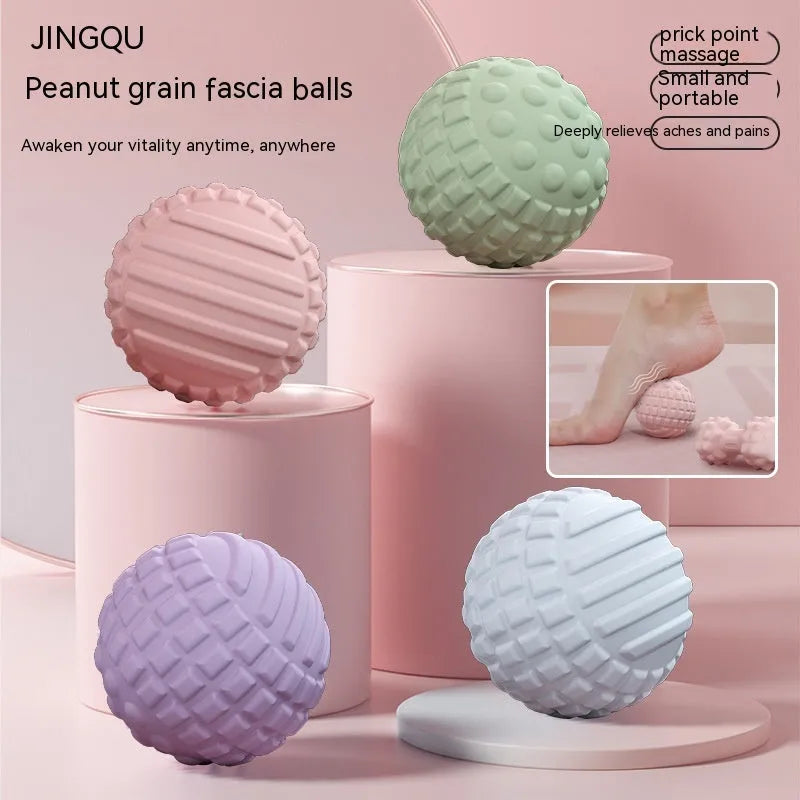 Blue TPR foot massage ball with textured surface shown next to foot for scale