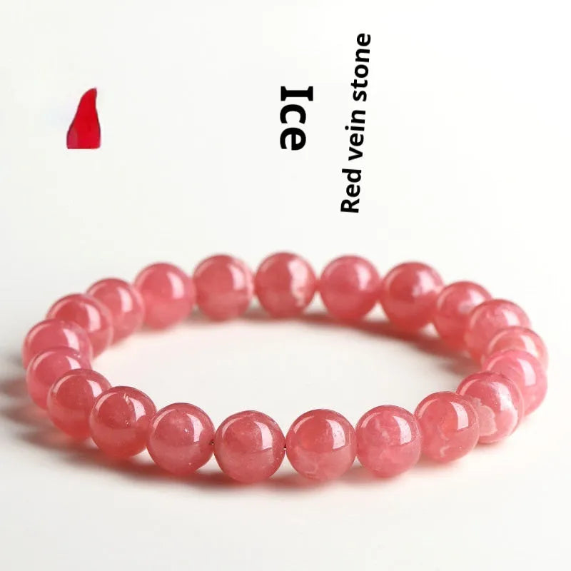 Women's crystal bracelet with geometric red stone beads and longevity lock charm
