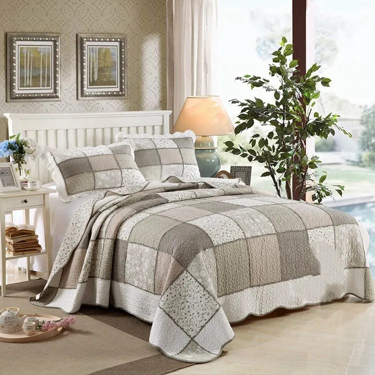 Pure cotton quilted bedspread three-piece set with pillowcases on a bed