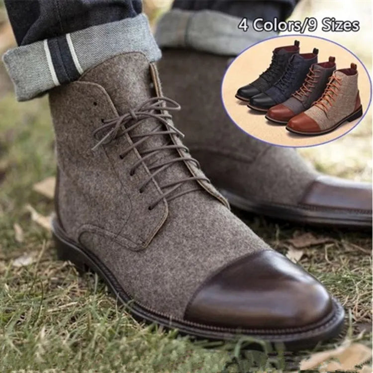 A pair of large leather boots for men with belt buckle detail and a rubber sole.