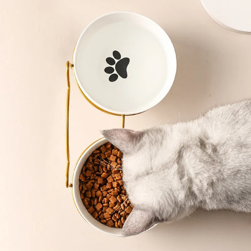 White ceramic pet bowl with cat footprints pattern in black iron cat ear frame