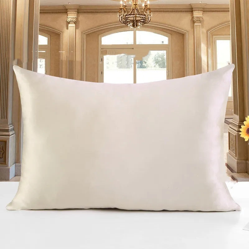 19 M double-sided silk pillowcase shown in apricot colour, lying flat to show envelope closure.