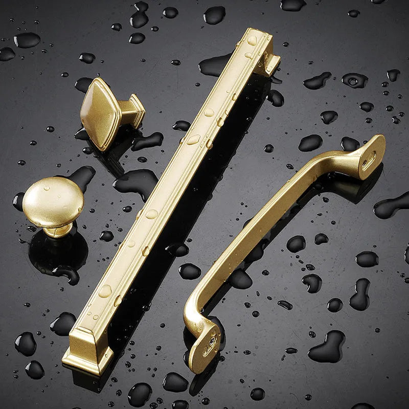 Gold aluminium T-shape cabinet door handle showing three hole distance options