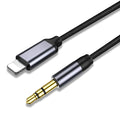 Nylon-braided audio cable with silver connector for headphone to car adapter connection.
