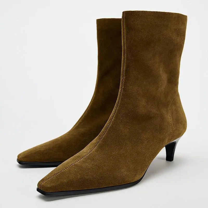 Women's black square toe ankle boots with side zipper and a mid kitten heel.