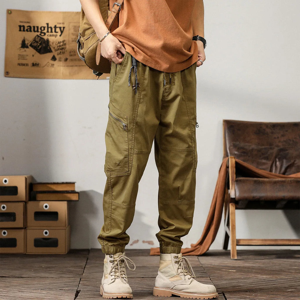 Men's American retro style tapered harem pants with ankle banded leg opening in cotton fabric