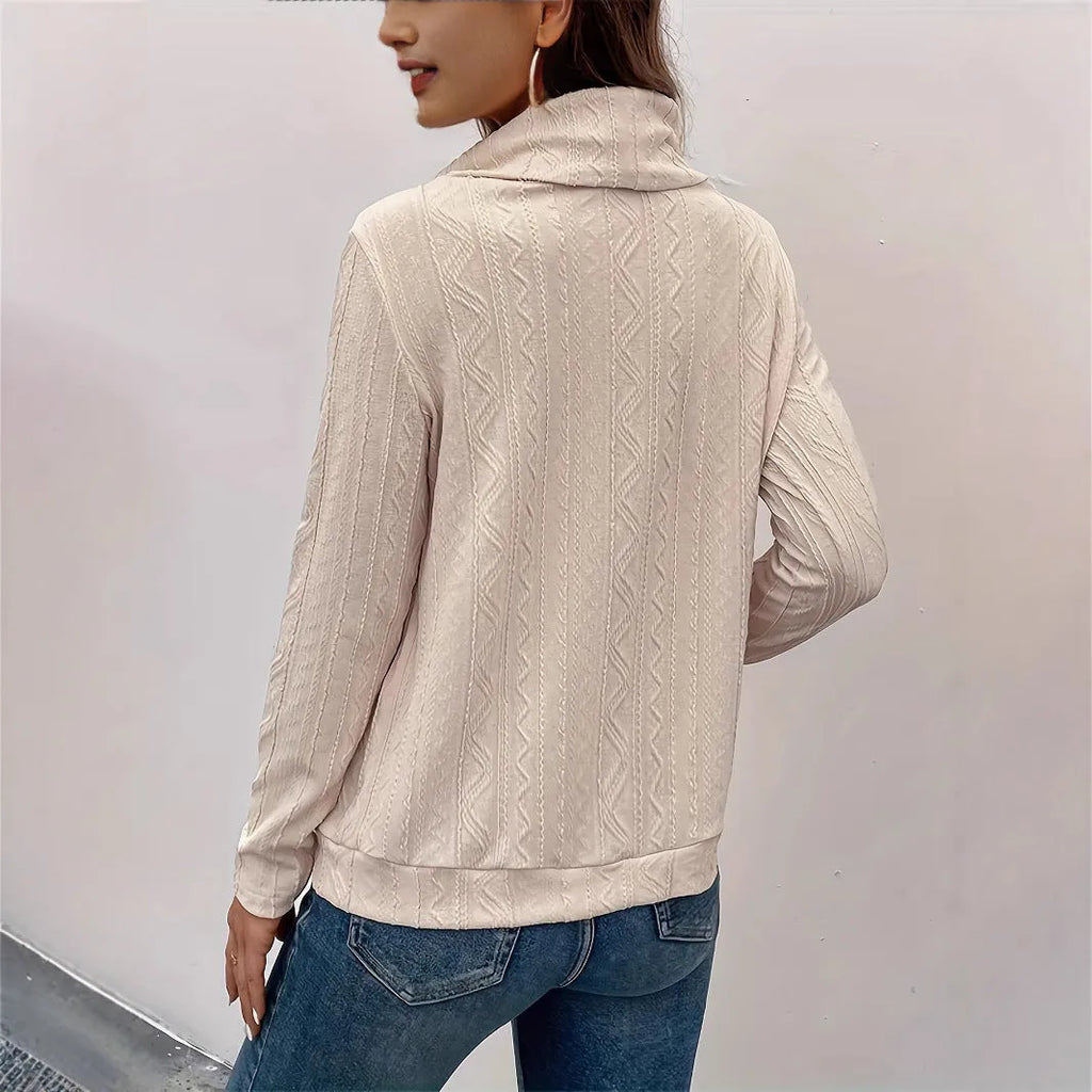 Apricot hooded pullover sweater with drawstring and long sleeves on a mannequin