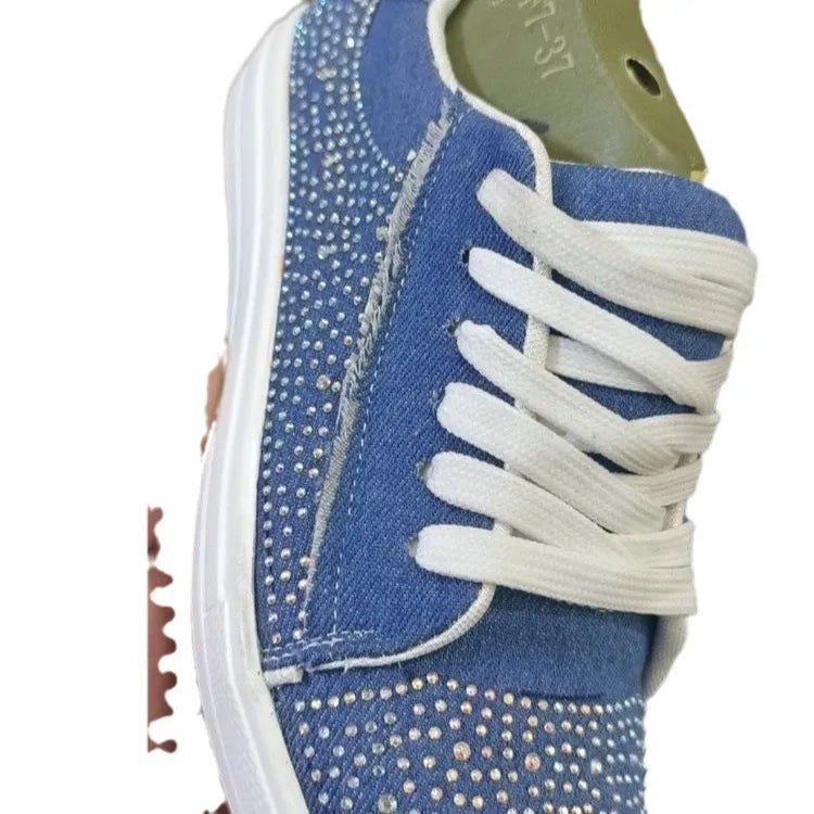 Plus size women's casual sports shoes with rhinestone detail, thick rubber sole, and lace-up closure in solid colour