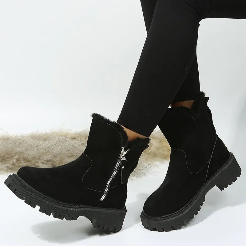 Women's black thick plush high-top snow boots with a side zipper and non-slip sole.