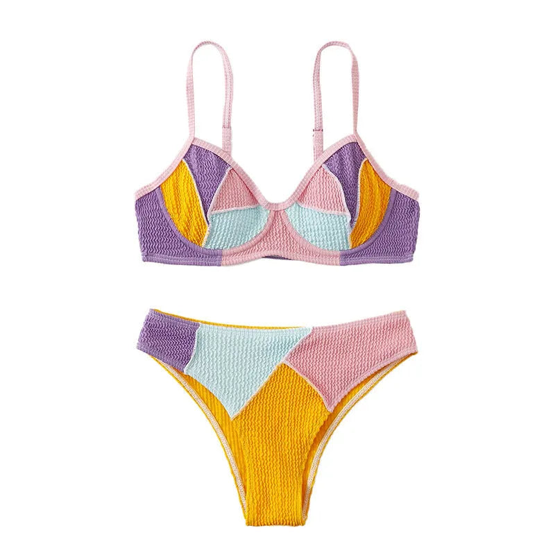 Ladies sleeveless push-up bikini set with steel bracket cups and crossover back stitching in a splicing colour pattern.