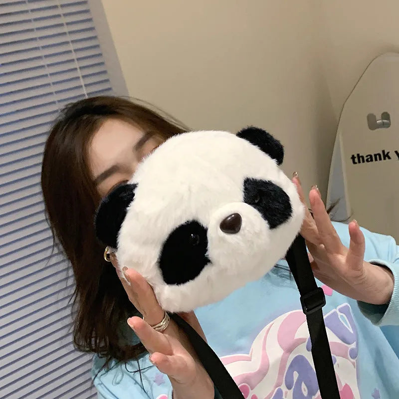 Plush crossbody shoulder bag with panda design, cylindrical shape measuring 18x15cm