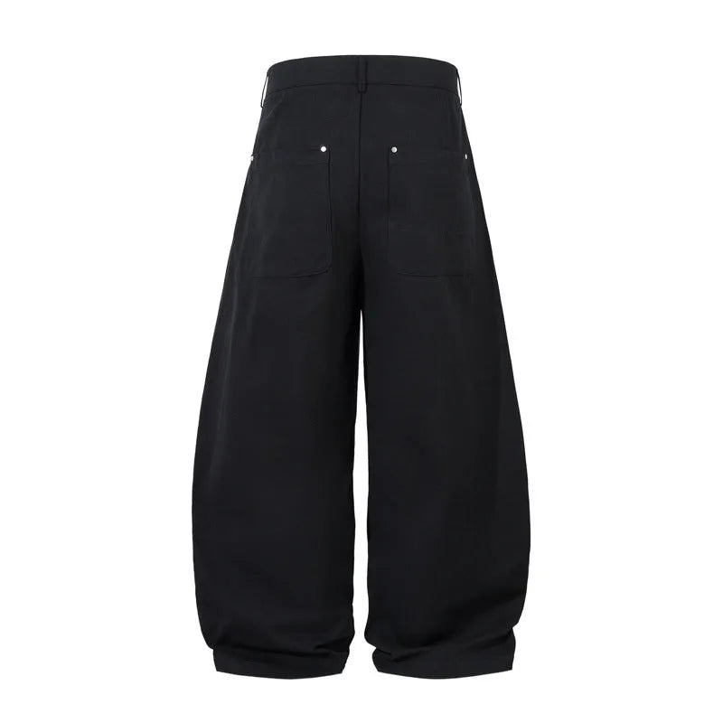 Men's black pleated machete casual trousers with wide-leg loose fit and cotton fabric