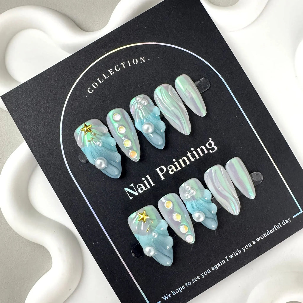 Blue shell-design plastic artificial nail tips set with four size options XS S M L