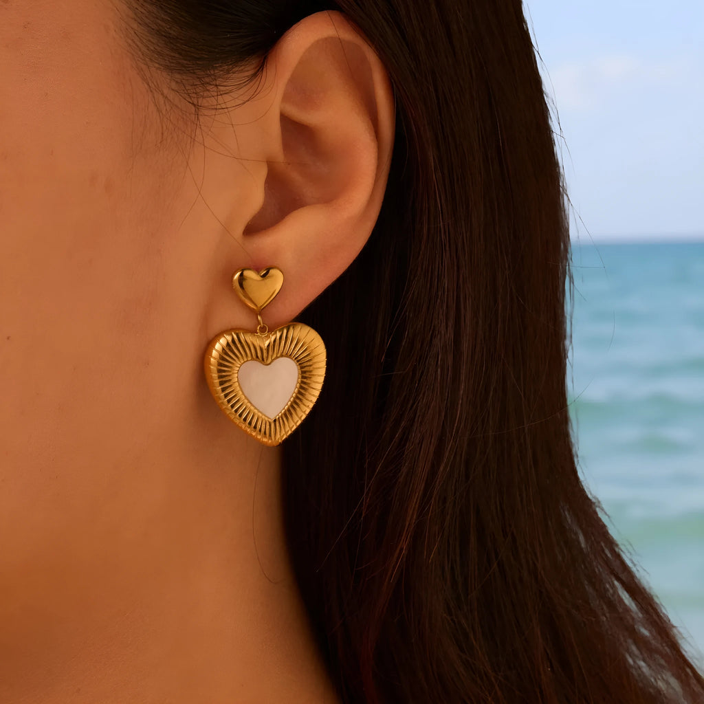 Stainless steel heart-shaped earrings with white fritillary design and 18K gold electroplating finish