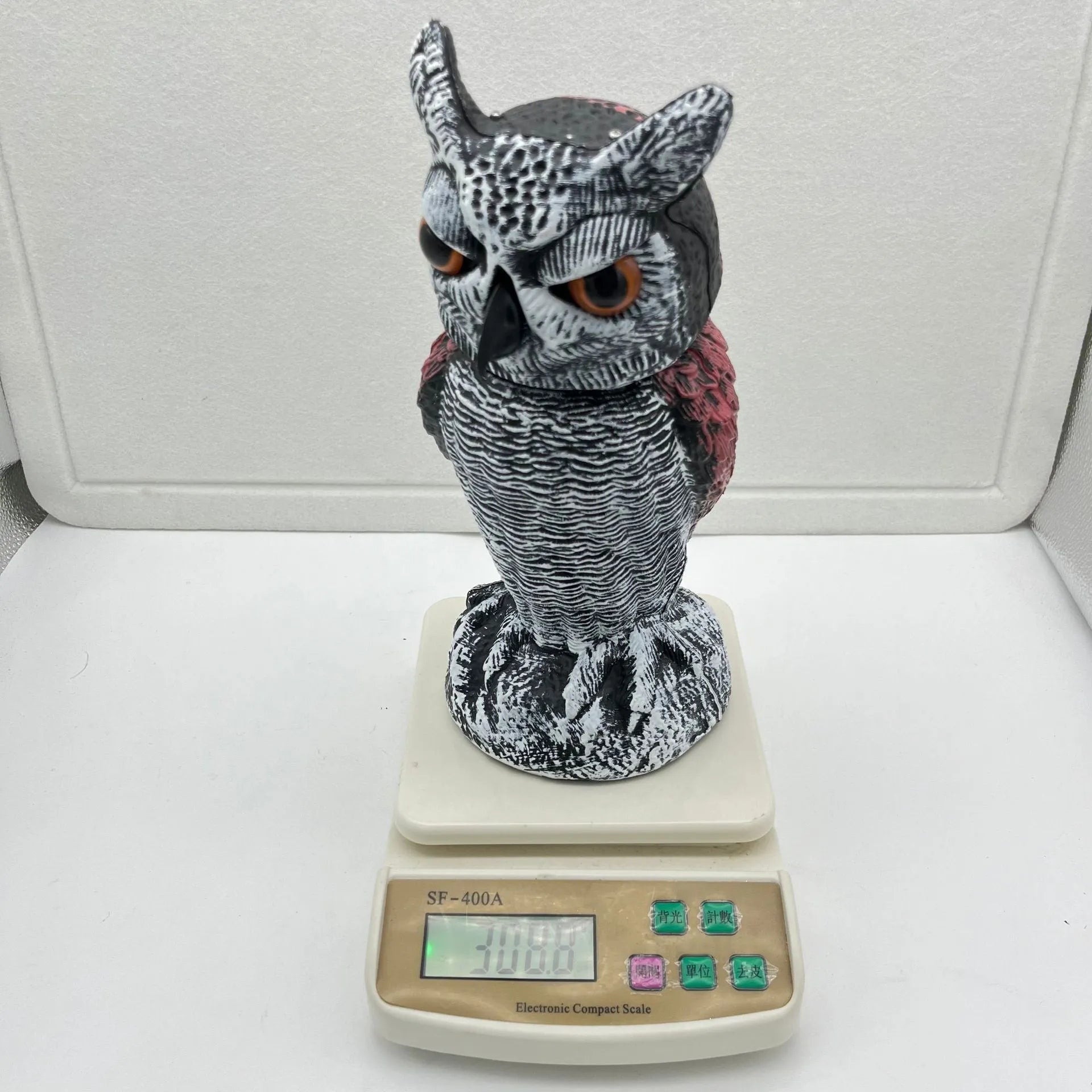 Artificial owl scarecrow bird deterrent ornament made from PE material with realistic casting details