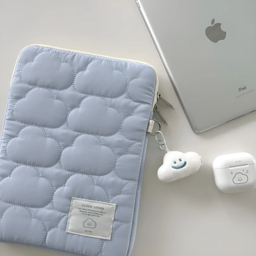 Cotton laptop sleeve with cloud embroidery in white or blue for 11 inch, 13-14 inch, and 15-15.6 inch devices.