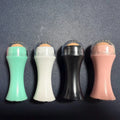 Portable volcanic stone facial roller for oily skin control in black, green, pink, or white