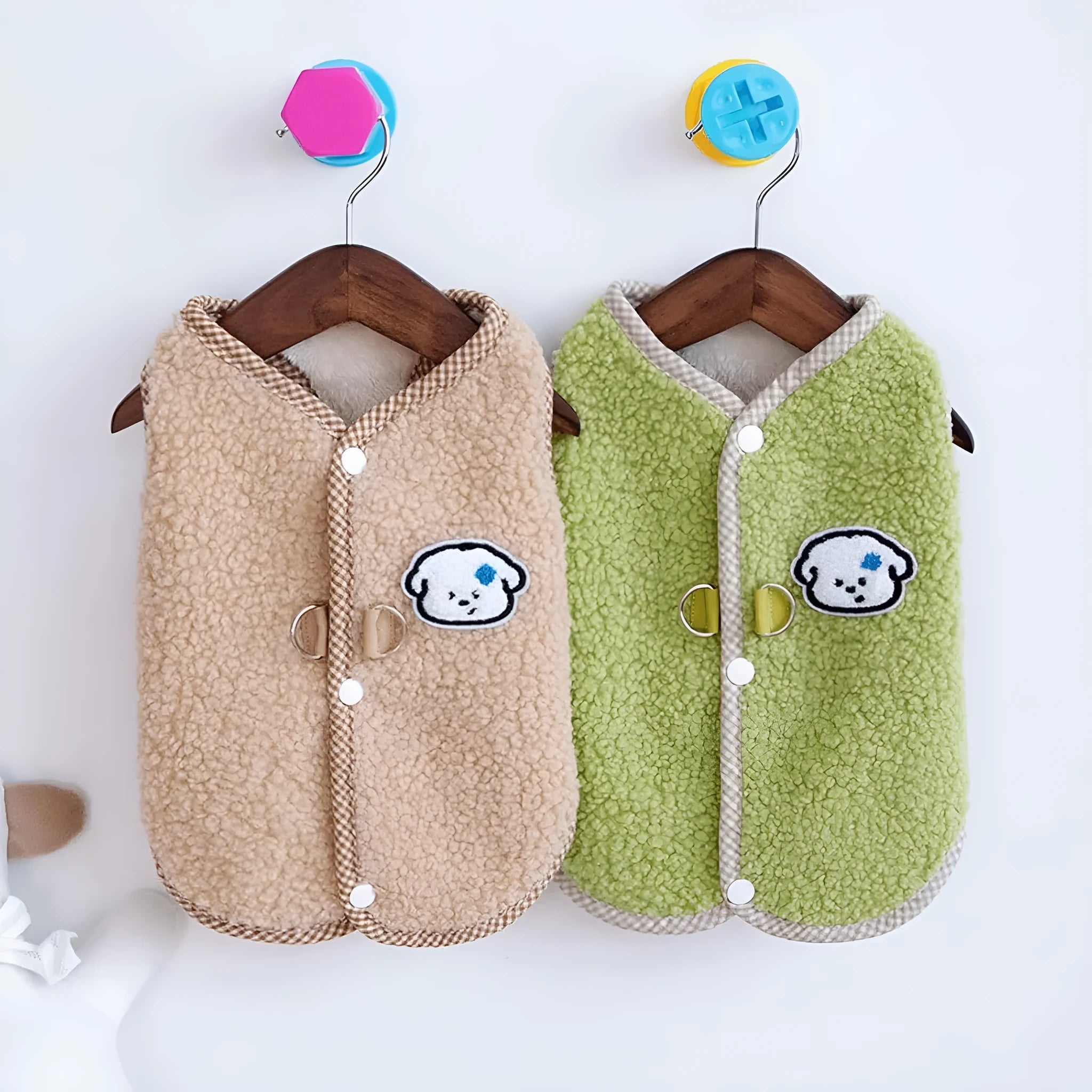 Green coral fleece dog vest with a metal leash ring on the back, sized for a small dog.