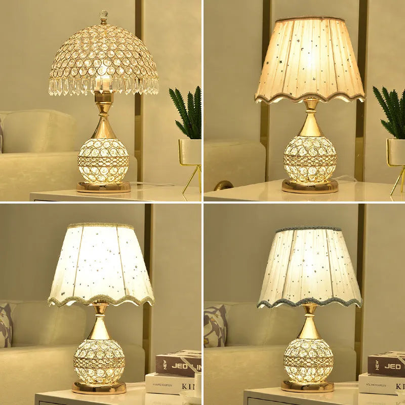 Crystal desk lamp with iron art base in gold finish on wooden table