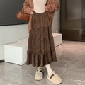 Beige corduroy A-line midi skirt with an elastic waistband on a hanger.