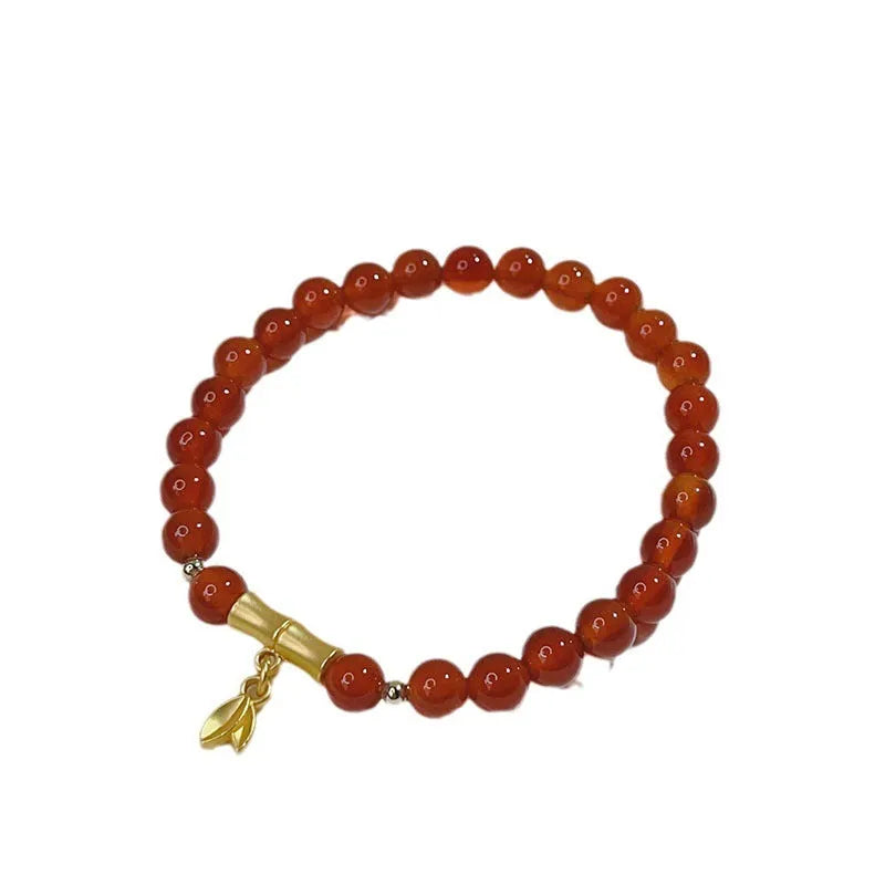 Handmade red agate bracelet with dragon motif for women, Chinese style.