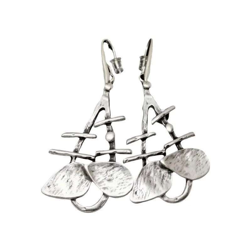 Silver alloy hollow leaf drop earrings for women with retro irregular step design and electroplated finish